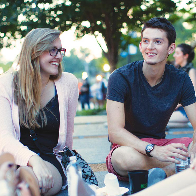 Two students socializing on campus
